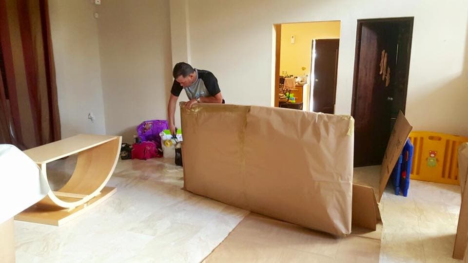 Furniture protected with packing paper during a local move